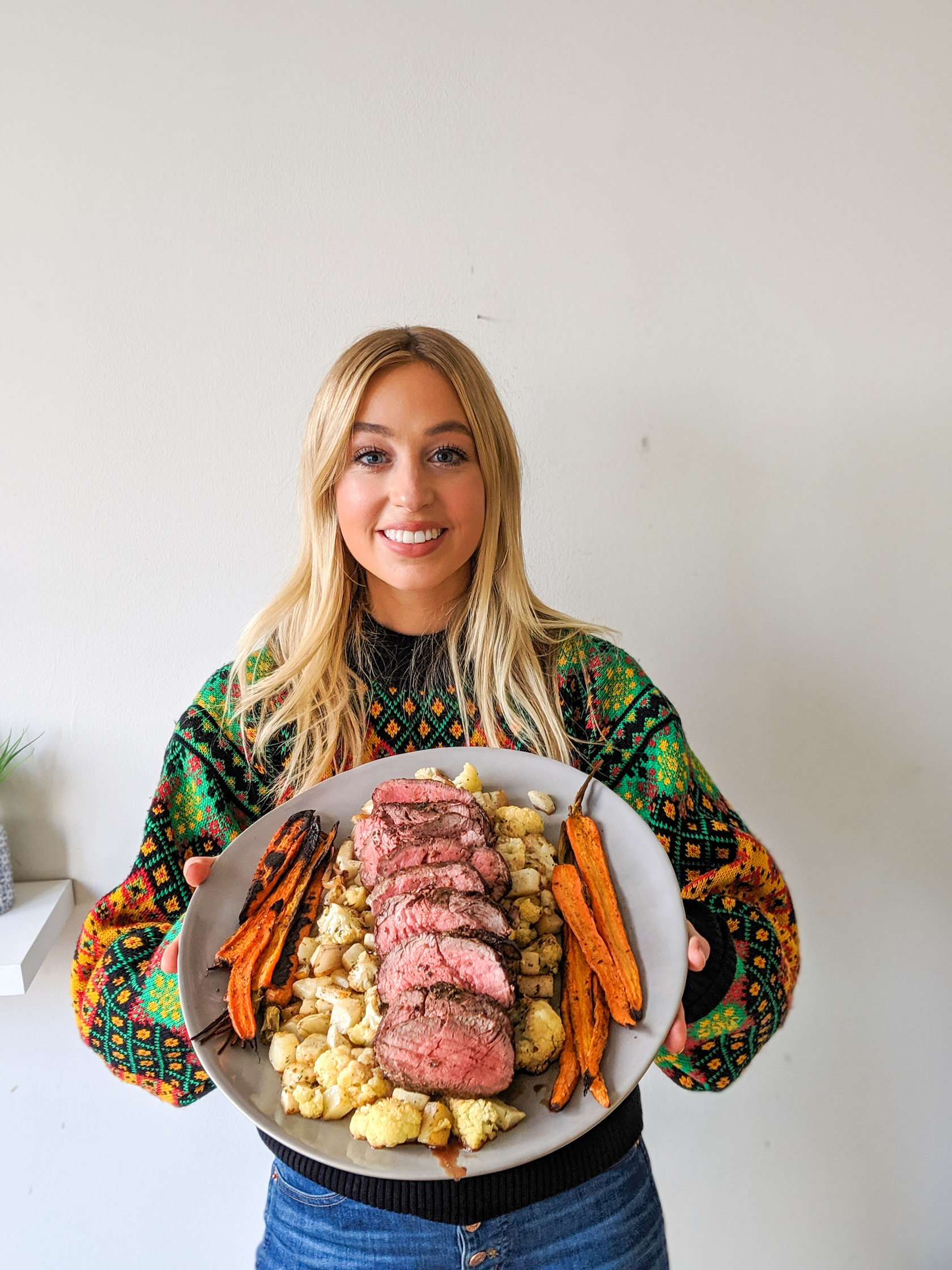 Platter of roast beef tenderloin with carrots, turnips and cauliflower