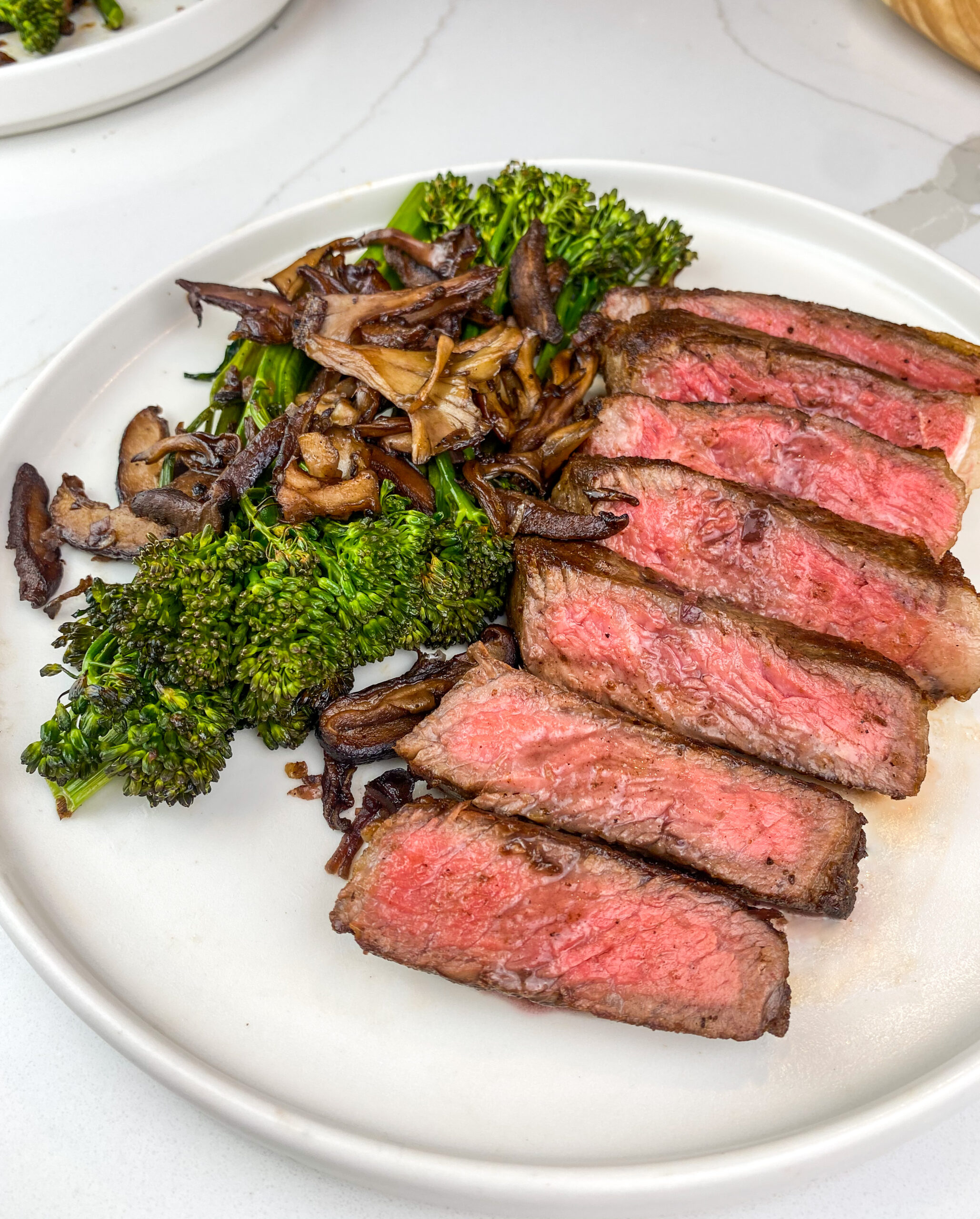 pan seared steak with red wine glazed mushrooms