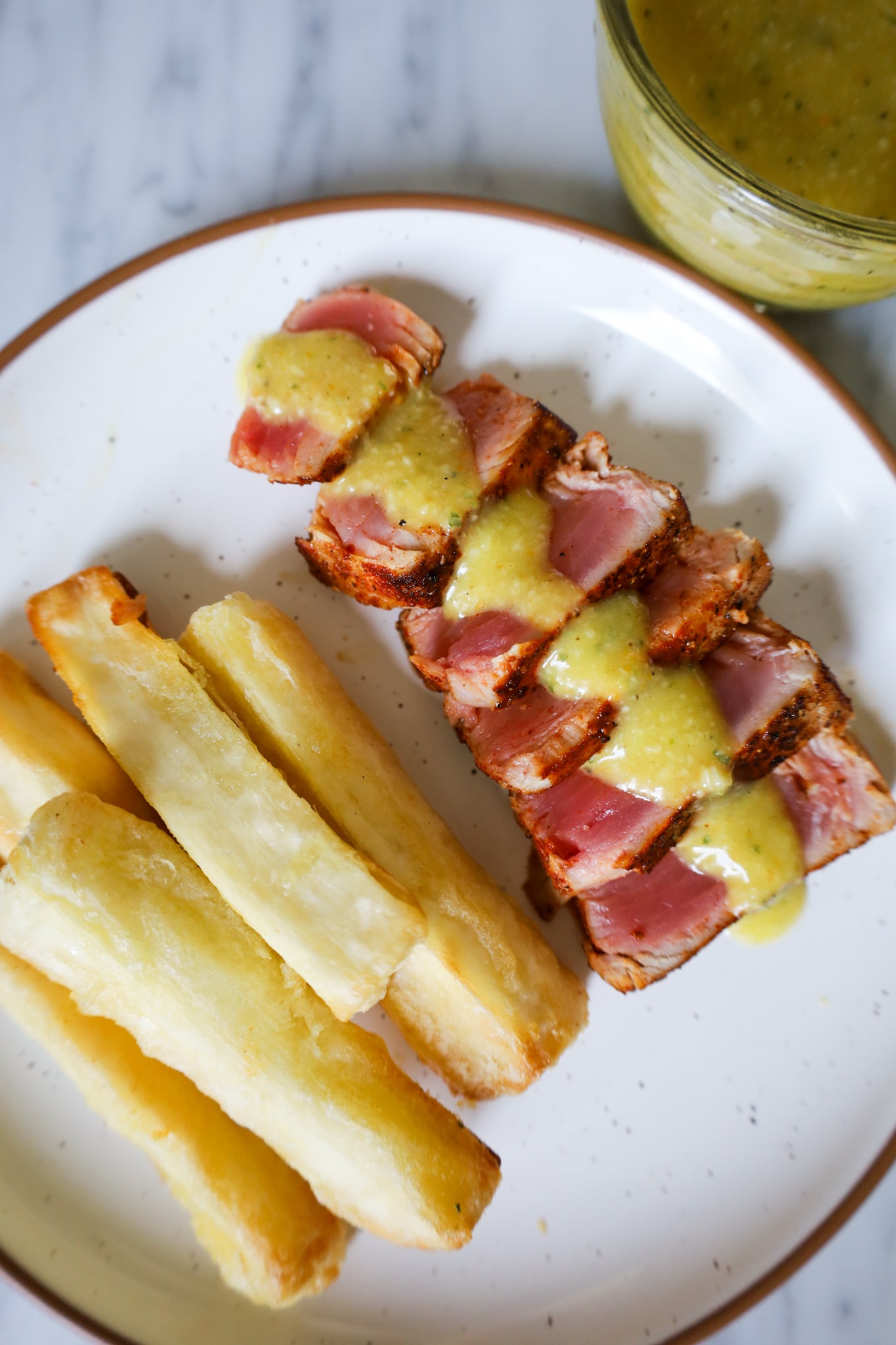 seared yellowfin tuna steaks with yuca fries and mojo