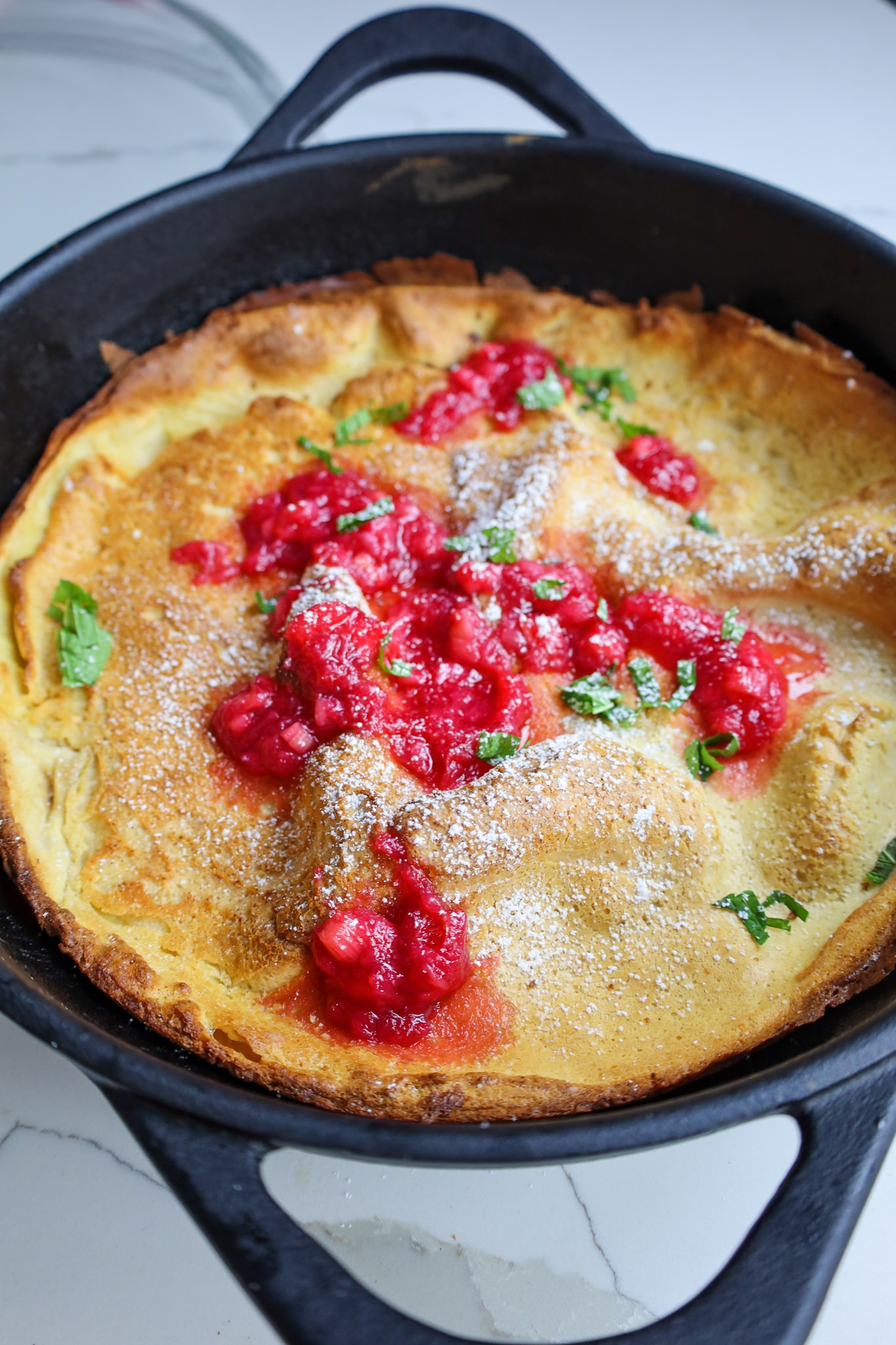 dutch pancake with rhubarb compote and mint