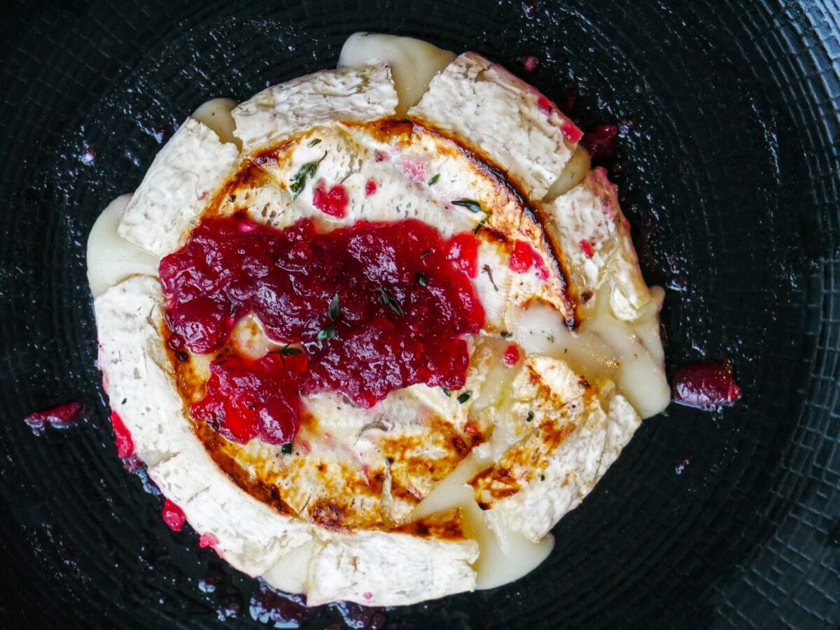 Baked Garlic Goat Brie with Cranberry, Rosemary and Thyme